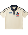 Beige polo shirt with brand logos on a white background