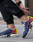 Model wearing Red Bull Racing custom sneaker - f1 sneakers, motorsports footwear, race day sneakers