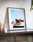 Bright and colorful framed Poster featuring Ayrton Senna in his Marlboro McLaren Formula One car.