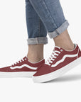 Rosso Lows sneakers worn by model - combining vintage racing aesthetics with modern street style.