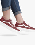 Rosso Lows sneakers worn by model - combining vintage racing aesthetics with modern street style.