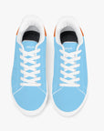 Top-down view of Gulf Racing sneakers - featuring premium leather, soft EVA insoles, and a timeless design.