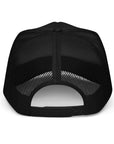 Back of the RISQUÉ trucker hat with adjustable snap closure for a custom fit, blending streetwear and high-end style.