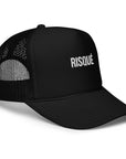 Side view of the RISQUÉ trucker hat with adjustable snap closure for a custom fit, blending streetwear and high-end style.