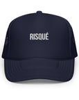 Navy RISQUÉ foam trucker hat with premium embroidery and a structured design for a bold, minimalist look.