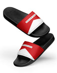The Red's pool slides, red and white strap on black sole, angled pair