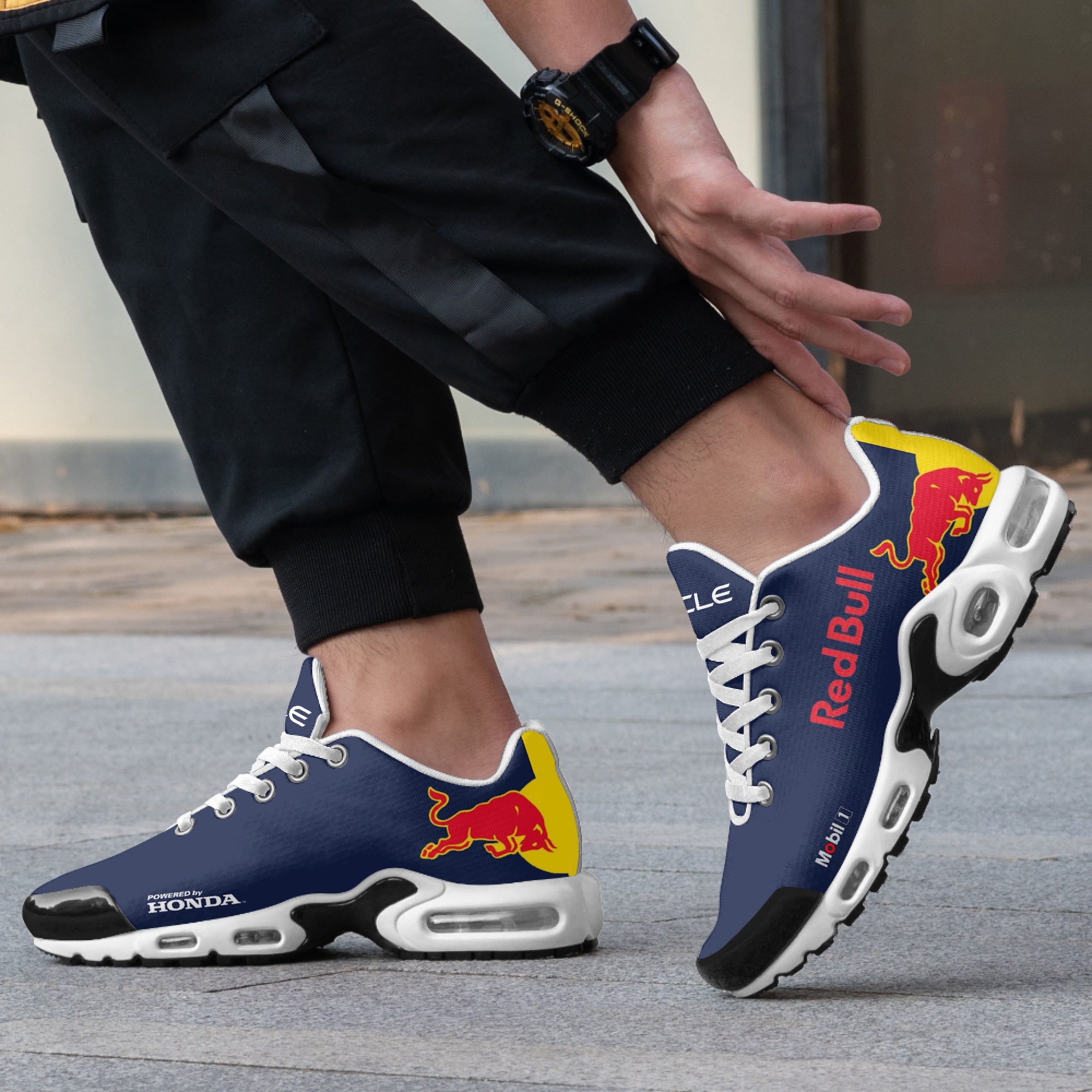Model wearing Red Bull Racing custom sneaker - f1 sneakers, motorsports footwear, race day sneakers