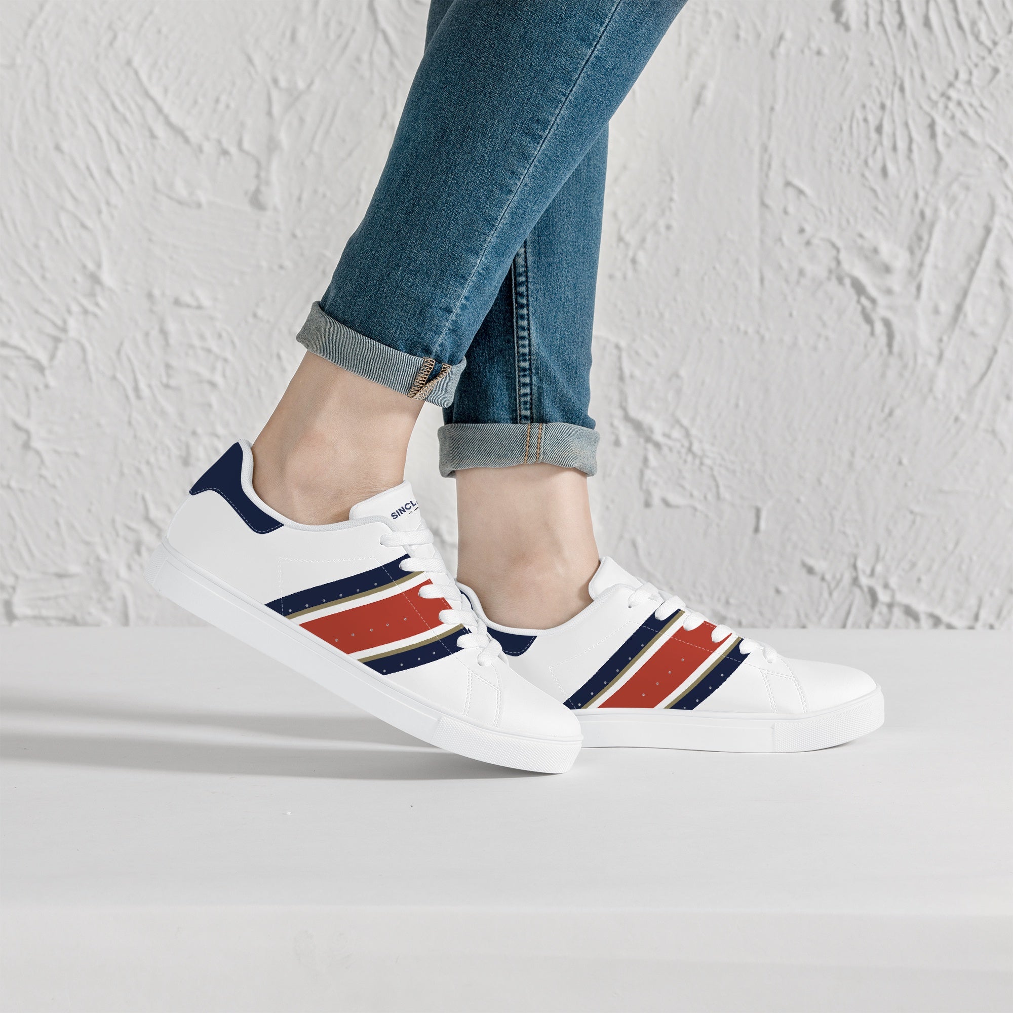 Rothman&#39;s sneakers worn by model - a perfect combination of motorsports heritage and modern street style.