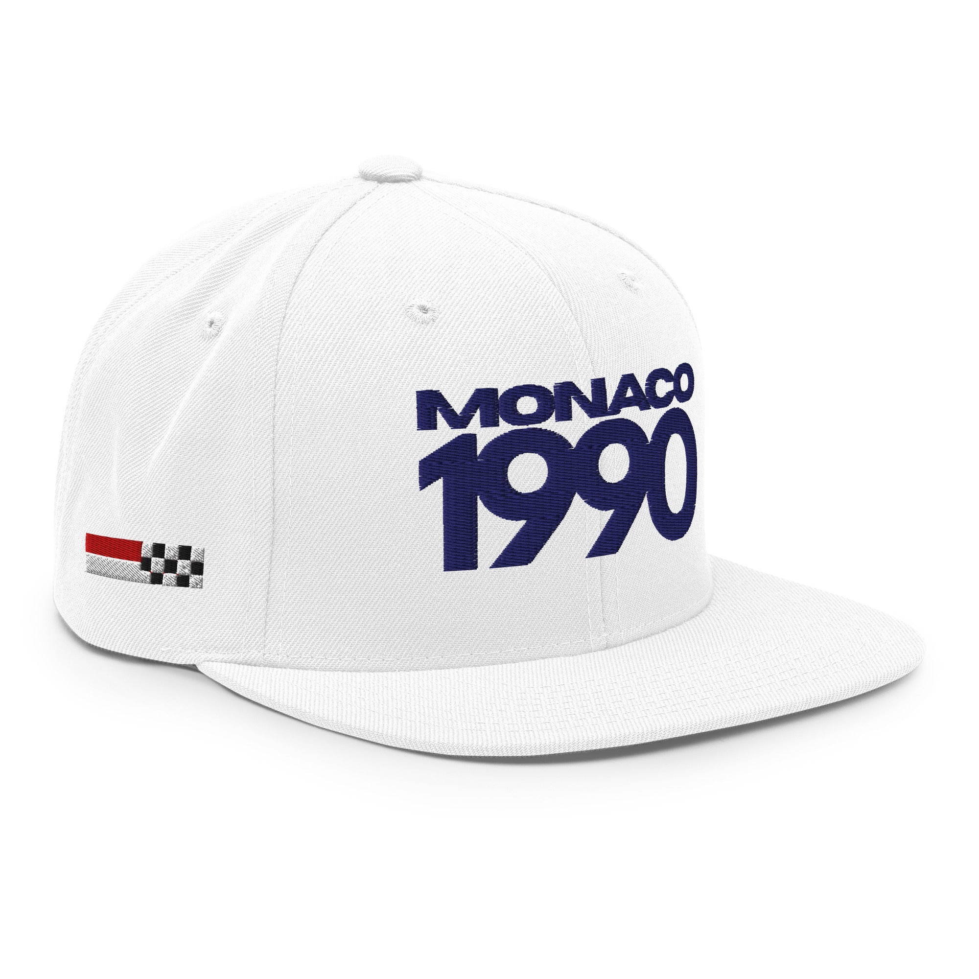 White cap with 'MONACO 1990' text and racing flag on a white background